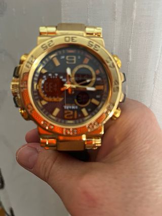 Reloj SMAEL dorado