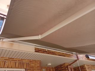 Toldo pared gris - toldo terraza