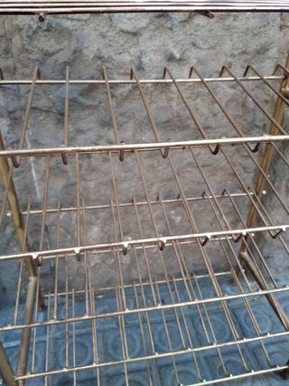 Botellero vintage metal dorado