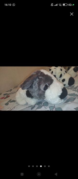 3 giocattoli di peluche a forma di testa di cane