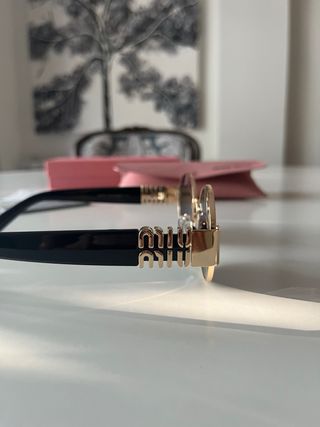 Gafas Miu Miu - Redondas Doradas