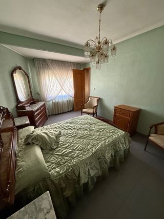 Dormitorio madera maciza clásico