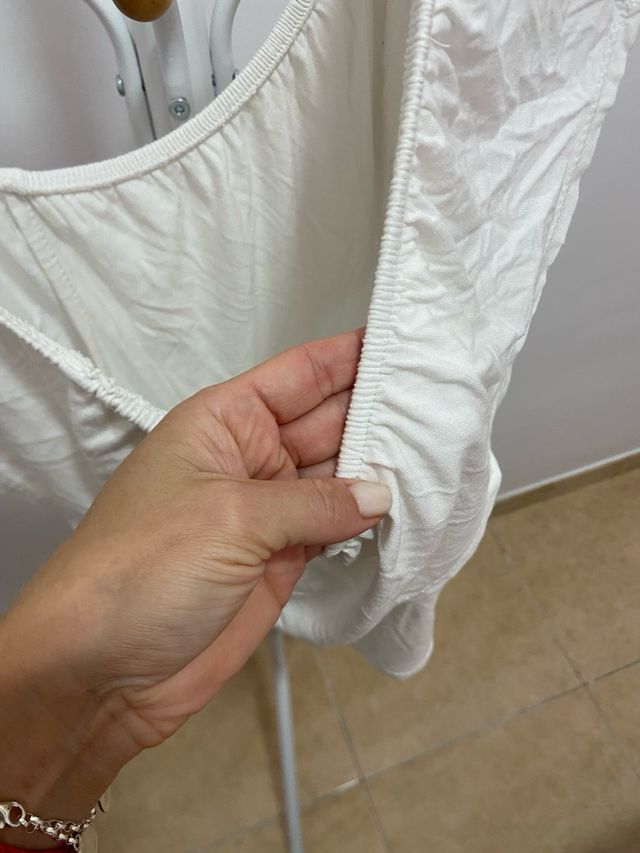 Top blanco hombros caídos