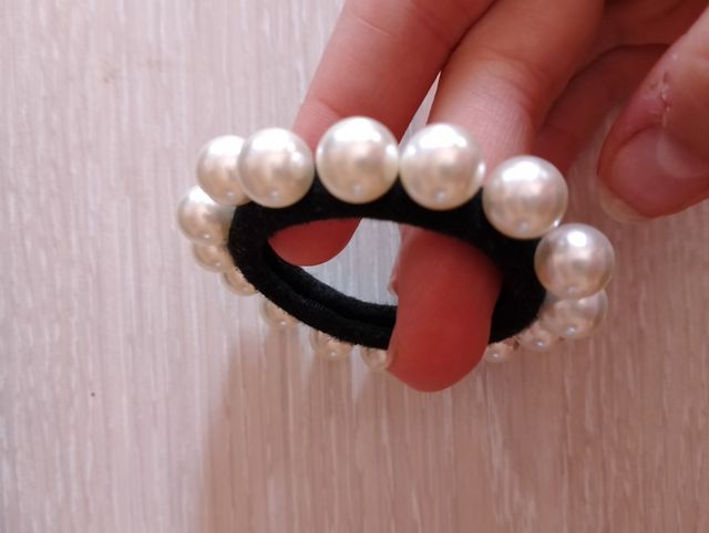 Coletero perlas blancas