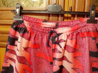 Completo sportivo rosso e nero