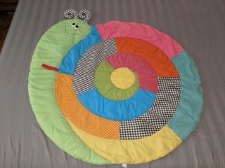 Manta bebé caracol multicolor