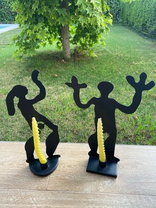 Candelabros figuras metal negro
