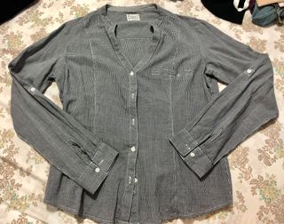 Camicia bianca e nera a quadri