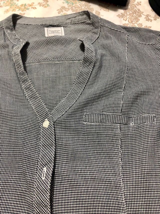 Camicia bianca e nera a quadri