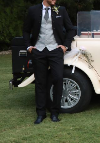 Traje de novio negro