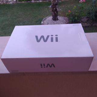 Wii + 4 juegos + volante + mando