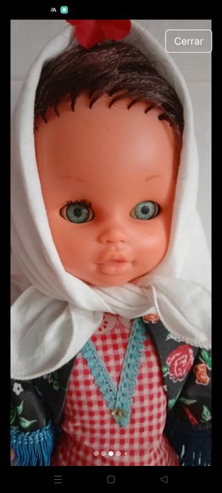 Muñeca chulapa antigua con peluche de regalo.