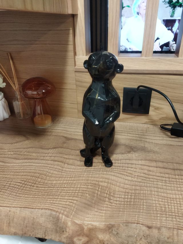 Suricato decorativo - Figura negra y dorada