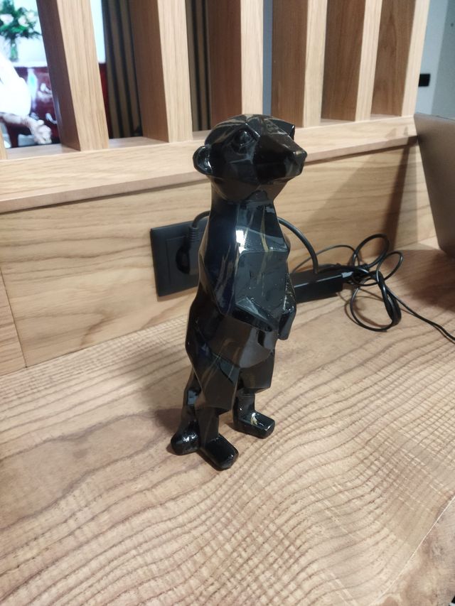 Suricato decorativo - Figura negra y dorada