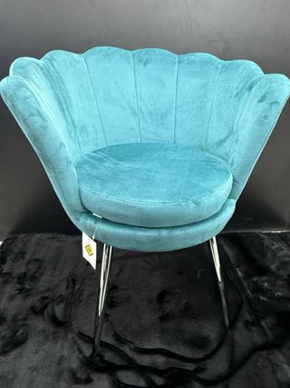 Poltrona design a conchiglia in velluto 