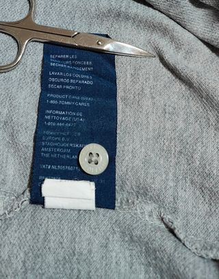 Polo Tommy Hilfiger gris talla S