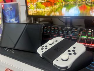 Nintendo Switch OLED Blanca + Juegos de Pokémon 
