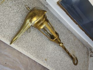 Lampara aceite metal dorada