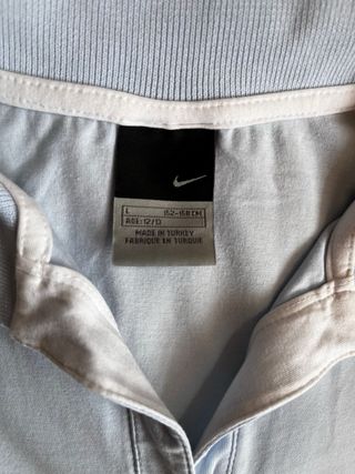 Polo Nike Dri-FIT celeste y blanco