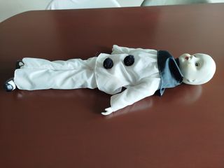 Muñeco payaso porcelana.
