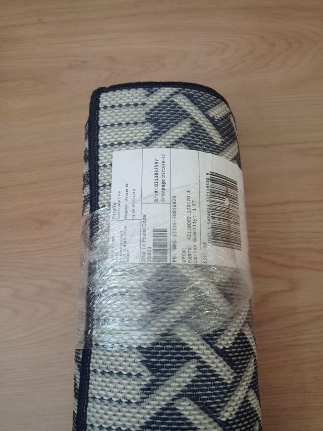 Alfombra azul y blanca 122×166 cm