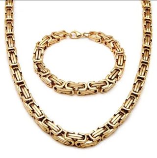 Juego de collar y pulsera dorados