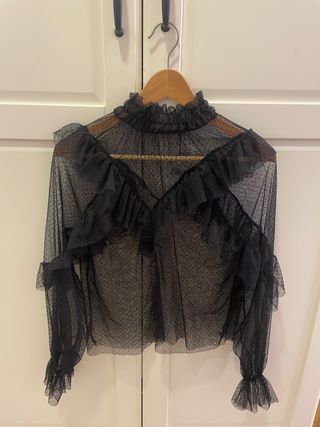 Blusa negra transparente