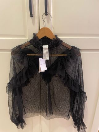 Blusa negra transparente