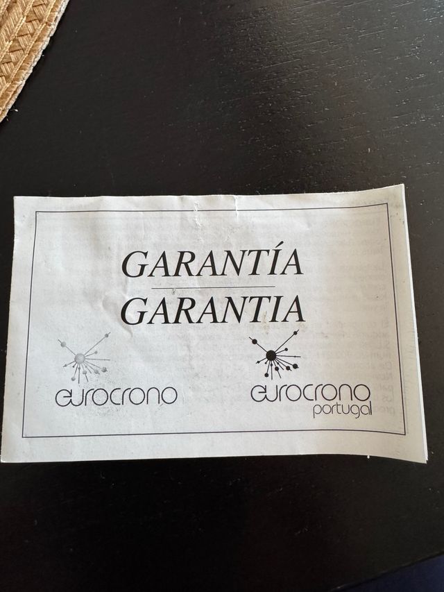 Reloj Guess dorado y plateado