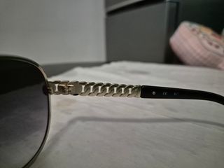 Occhiali da sole Guess - oro e neri