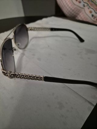 Occhiali da sole Guess - oro e neri