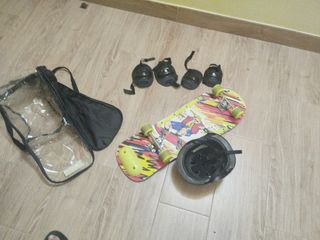 Monopatín con casco, funda y rodilleras incluidos 