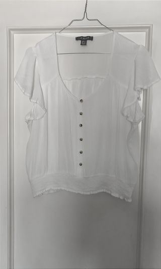 Blusa Primark blanca 44 volantes y rizo