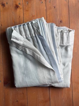 Tende sartoriali a binario celeste e bianche