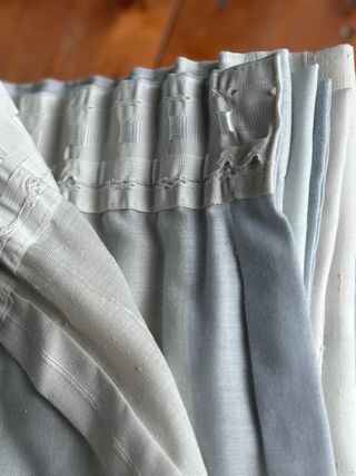 Tende sartoriali a binario celeste e bianche