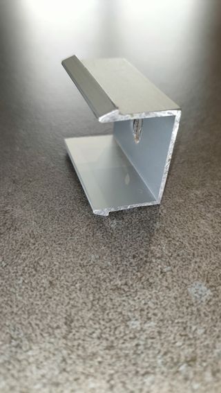 FIXACIONS DE PERFILS D'ALUMINI