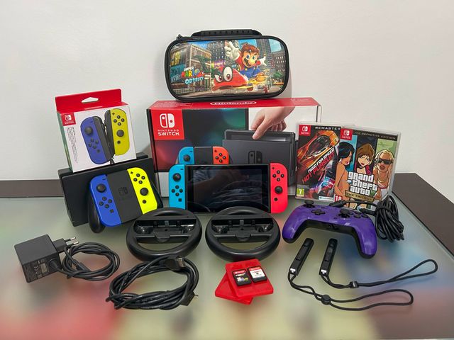 Nintendo Switch + juegos + mandos y extras