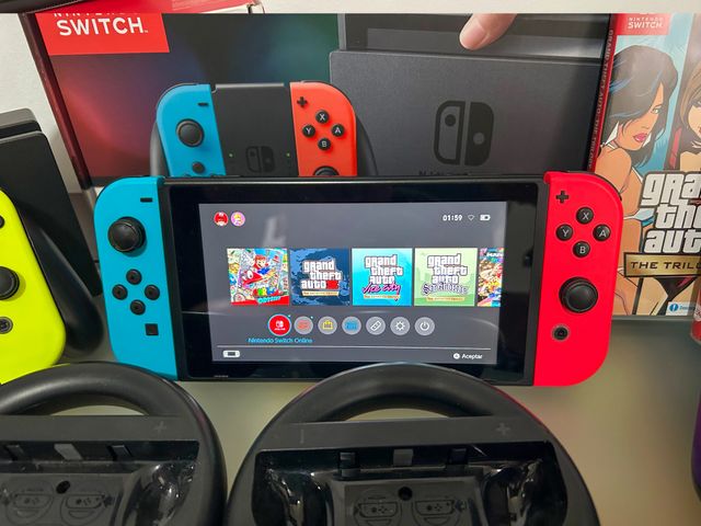 Nintendo Switch + juegos + mandos y extras
