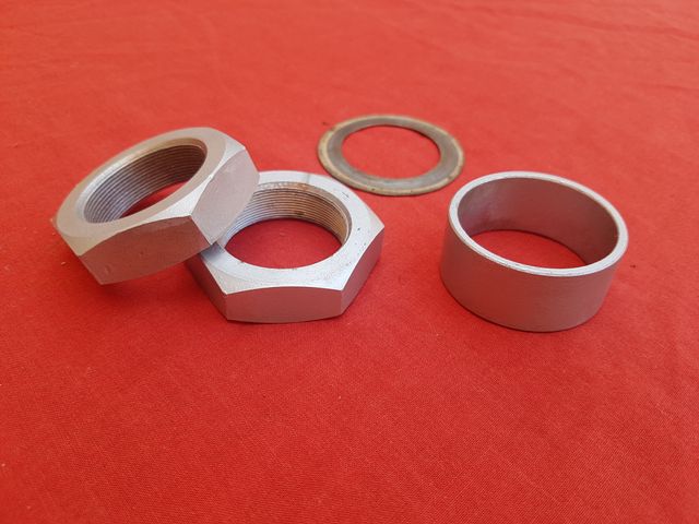 Tuercas eje kymco mxu y kxr 250