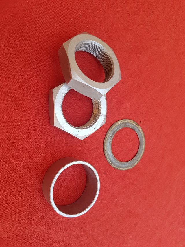 Tuercas eje kymco mxu y kxr 250