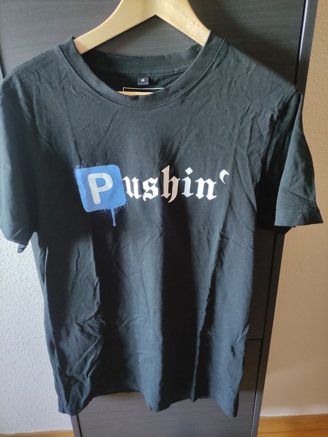 Camiseta Pushin' negra talla M,en muy buen estado,