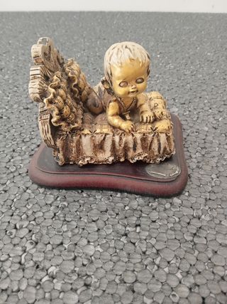 Statuetta bimbo vintage