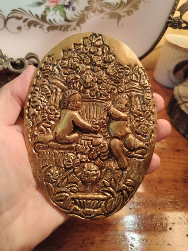 Fregio bronzo ovale: angioletti