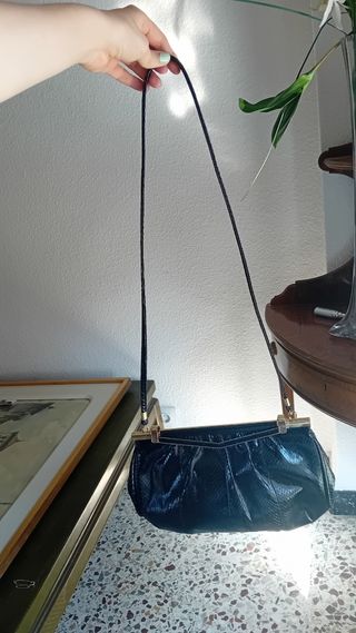 Bolso negro piel serpiente
