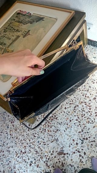 Bolso negro piel serpiente