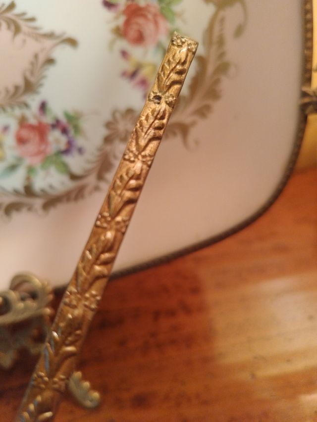 Fregio in bronzo antico