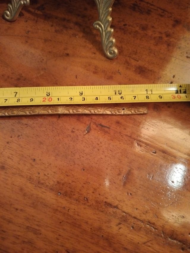 Fregio in bronzo antico