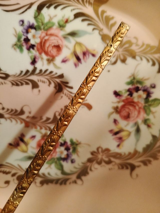 Fregio in bronzo antico