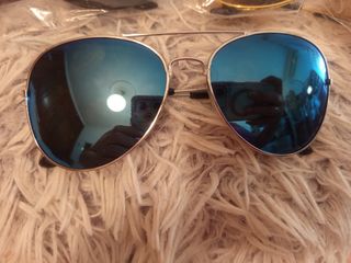 Gafas sol aviador azules..1.50 cada una 