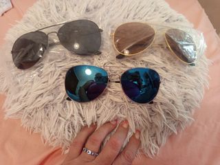 Gafas sol aviador azules..1.50 cada una 